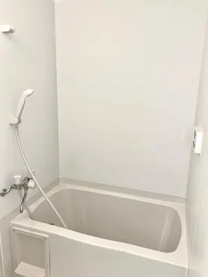 a white bath tub in a bathroom with a sink at \u6771\u4eac \u8db3\u7acb\u533a\u9752\u4e95 Tokyo Adachiku Aoi in Tokyo