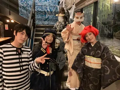 a group of people dressed up in halloween costumes at Wise Owl Hostels River Tokyo in Tokyo