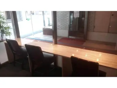 a large wooden table with chairs in a room at Hotel Suntargas Otsuka - Vacation STAY 08513v in Tokyo