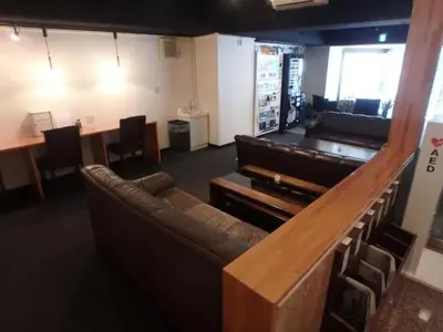 a waiting room with a couch and a piano at Hotel Suntargas Otsuka - Vacation STAY 08513v in Tokyo