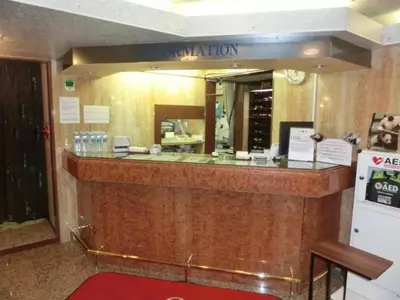 a reception counter in a restaurant with a mirror at Hotel Suntargas Otsuka - Vacation STAY 08513v in Tokyo