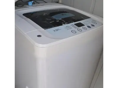 a washing machine in the corner of a bathroom at Hotel Suntargas Otsuka - Vacation STAY 08508v in Tokyo