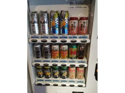 a refrigerator filled with lots of cans of soda at Hotel Suntargas Otsuka - Vacation STAY 08508v in Tokyo