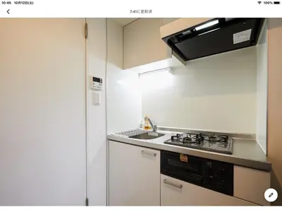a small kitchen with a sink and a stove at Marvelous Kinshicho - Vacation STAY 12954v in Tokyo