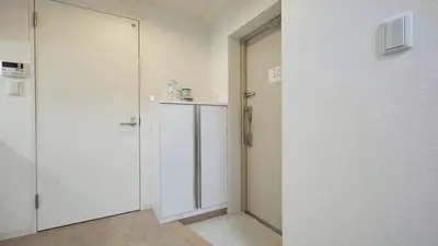a room with two white doors and a counter at Marvelous Kinshicho - Vacation STAY 12770v in Tokyo
