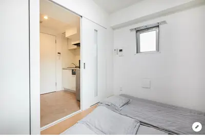 a small bedroom with a bed and a window at Marvelous Kinshicho - Vacation STAY 12770v in Tokyo