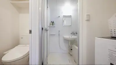a white bathroom with a toilet and a sink at Marvelous Kinshicho - Vacation STAY 12770v in Tokyo