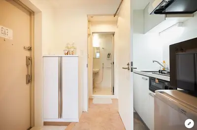 a small kitchen with a sink and a refrigerator at Marvelous Kinshicho - Vacation STAY 11878v in Tokyo