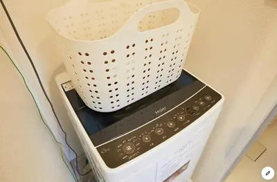 a white basket sitting on top of a microwave at Marvelous Kinshicho - Vacation STAY 11878v in Tokyo