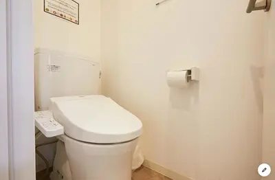 a bathroom with a white toilet and a telephone at Marvelous Kinshicho - Vacation STAY 11878v in Tokyo