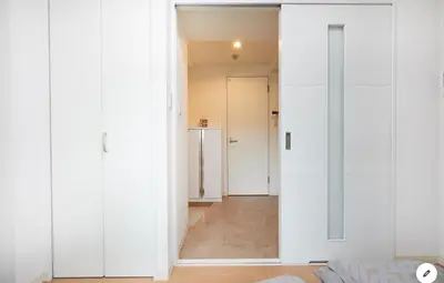 a room with white walls and a hallway at Marvelous Kinshicho - Vacation STAY 12965v in Tokyo