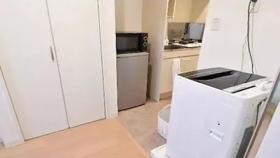 a kitchen with a printer in the middle of a room at Marvelous Kinshicho - Vacation STAY 13097v in Tokyo