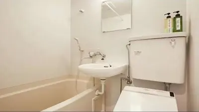 a bathroom with a toilet and a sink and a bath tub at Marvelous Kinshicho - Vacation STAY 13097v in Tokyo