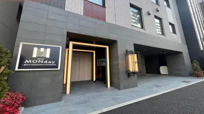 a entrance to a building with a sign on it at MONday Apart Asakusabashi Akihabara in Tokyo