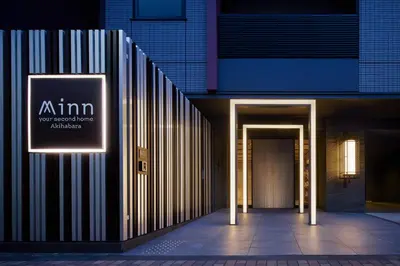 a building with a sign on the side of it at Minn Akihabara in Tokyo