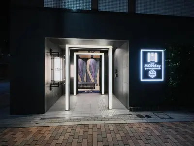 a hallway with two sets of doors in a building at MONday Apart Premium UENO OKACHIMACHI in Tokyo
