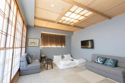 a living room with two couches and a couch at \u706f\u5149\u65c5\u9928 Light hotel in Tokyo