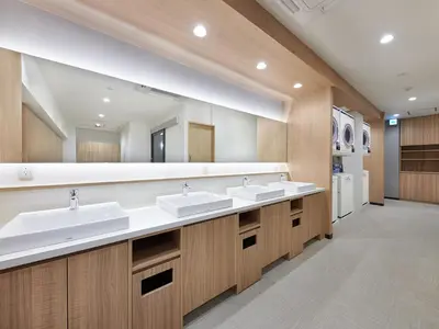 a bathroom with two sinks and a large mirror at Smart Stay SHIZUKU Shinagawa-Oimachi in Tokyo