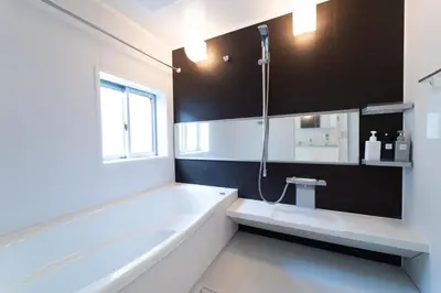 a bathroom with a bath tub and a shower at SATELLITE HOTEL Ebisu \u30b5\u30c6\u30e9\u30a4\u30c8\u30db\u30c6\u30eb\u6075\u6bd4\u5bff in Tokyo