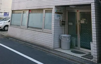 a trash can sitting outside of a building at Isshuku Ryokan Asakusabashi - Vacation STAY 17363v in Tokyo
