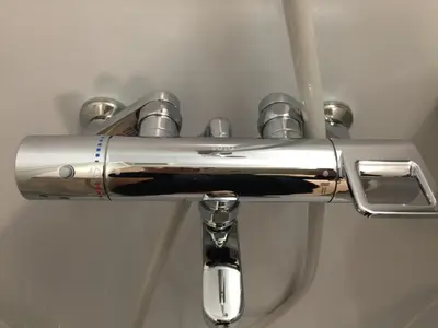 a close up of a silver toilet paper holder at Isshuku Ryokan Asakusabashi - Vacation STAY 17363v in Tokyo