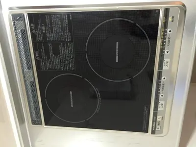 a microwave oven with the door open with circles on it at Isshuku Ryokan Asakusabashi - Vacation STAY 17363v in Tokyo