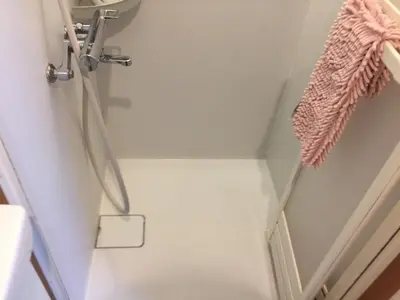 a bathroom with a showeruliculiculiculiculiculiculiculiculiculiculic at Isshuku Ryokan Asakusabashi - Vacation STAY 17365v in Tokyo
