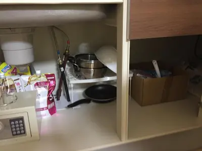 a kitchen counter with a stove with a pan on it at Isshuku Ryokan Asakusabashi - Vacation STAY 17365v in Tokyo