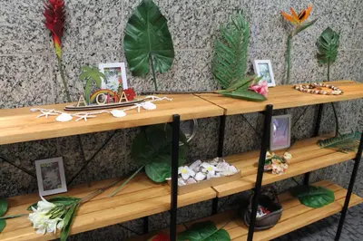 a wooden shelf with some items on it at Okubo Hotel Hawaii in Tokyo