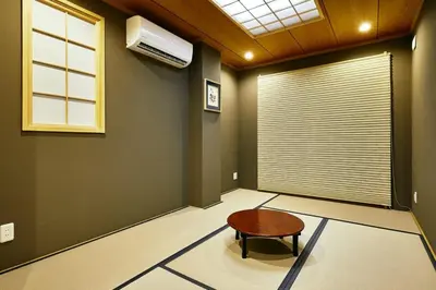 a living room with a table and a window at 634 Condo Yotsuya - Vacation STAY 14799v in Tokyo
