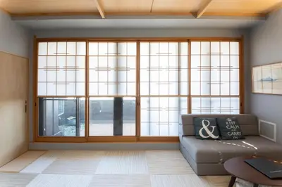 a living room with a couch and a large window at Light Hotel - Vacation STAY 17340v in Tokyo