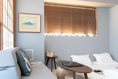 a living room with a couch and a table at Light Hotel - Vacation STAY 17340v in Tokyo