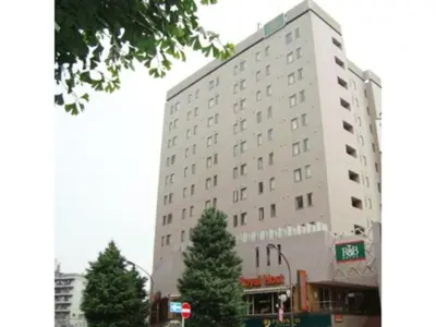 a large white building with trees in front of it at R&B Hotel Otsuka Eki Kitaguchi - Vacation STAY 14227v in Tokyo