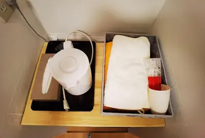 a drawer with a utensil and a white towel at belle via tokyo - Vacation STAY 18577v in Tokyo