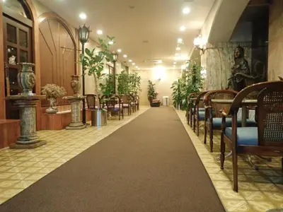 a long aisle in a restaurant with tables and chairs at Hotel Suntargas Ueno - Vacation STAY 08474v in Tokyo