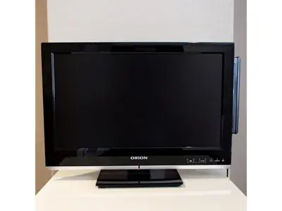 a flat screen tv sitting on top of a table at Hotel Suntargas Ueno - Vacation STAY 08478v in Tokyo
