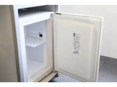 an empty refrigerator with its door open in a room at R&B Hotel Tokyo Toyocho - Vacation STAY 14255v in Tokyo