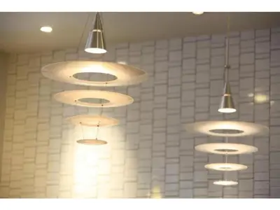 a bunch of lights hanging from the ceiling in a room at R & B Hotel Kamata Higashiguchi - Vacation STAY 14841v in Tokyo