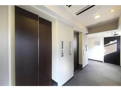 a hallway of an office building with a door at R & B Hotel Kamata Higashiguchi - Vacation STAY 14841v in Tokyo