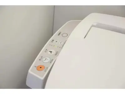 a white remote control sitting on top of a wall at R & B Hotel Kamata Higashiguchi - Vacation STAY 14835v in Tokyo