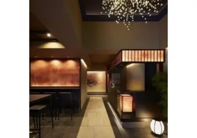 a restaurant with a bar with a chandelier at Sakura Sky Hotel - Vacation STAY 18444v in Tokyo