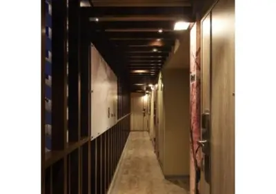 a hallway with a long corridor with a long hallway at Sakura Sky Hotel - Vacation STAY 18444v in Tokyo