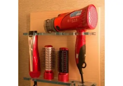 a shelf with a hairdryer and a hair dryer at Sakura Sky Hotel - Vacation STAY 18445v in Tokyo