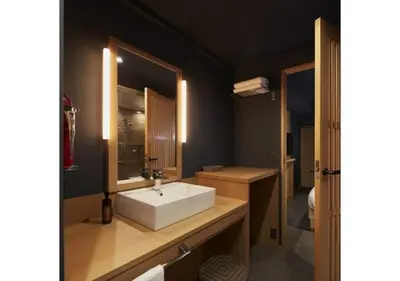 a bathroom with a white sink and a mirror at Sakura Sky Hotel - Vacation STAY 18445v in Tokyo