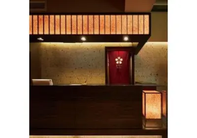 a lobby with a red door in a building at Sakura Sky Hotel - Vacation STAY 18442v in Tokyo