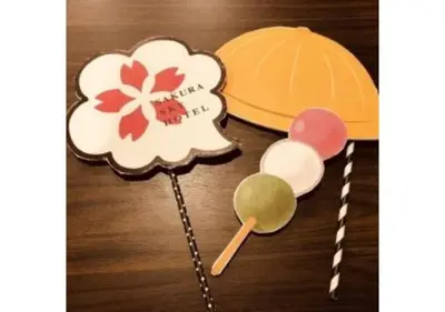 a group of lollipops and a hat on a table at Sakura Sky Hotel - Vacation STAY 18442v in Tokyo