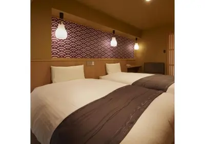 a hotel room with two beds and two lights at Sakura Sky Hotel - Vacation STAY 18449v in Tokyo
