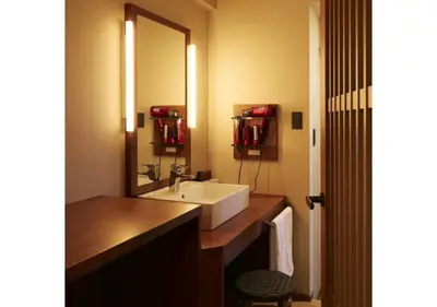 a bathroom with a sink and a large mirror at Sakura Sky Hotel - Vacation STAY 18449v in Tokyo