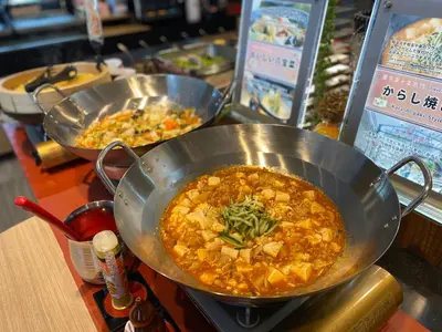 a counter with two bowls of food on a counter at Almont Hotel Nippori in Tokyo