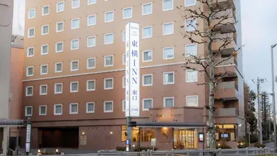 a building with a sign in front of it at Toyoko Inn Tokyo Akabane-eki Higashi-guchi in Tokyo